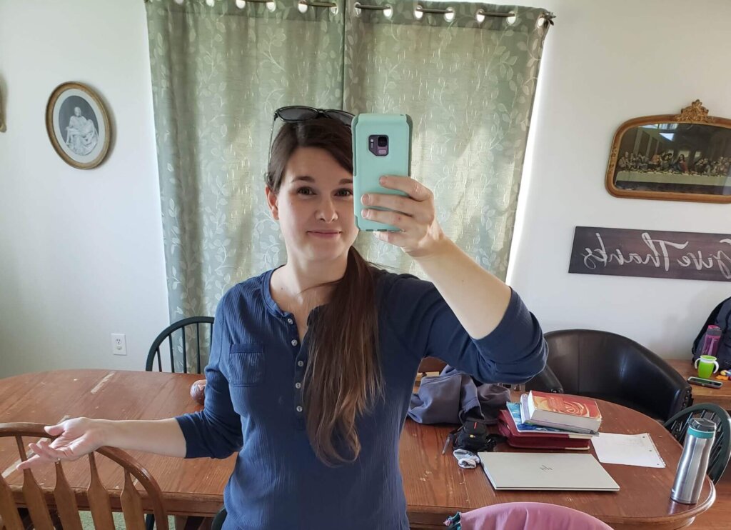 Catholic mom using the Intentional Day Blueprint planner